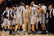 Head Coach Gregg Popovich of the San Antonio Spurs speaks in a huddle with his players while facing the Memphis Grizzlies in Game One of the Western Conference Finals during the 2013 NBA Playoffs on May 19, 2013 at the AT&T Center in San Antonio, Texas. (Getty Images)