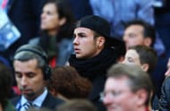 Mario Gotze of Borussia Dortmund looks on from the stands.