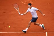 Roger Federer of Switzerland plays a forehand during his Men's Singles match against Pablo Carreno-Busta of Spain during day one of the French Open at Roland Garros on May 26, 2013 in Paris, France. (Photo by Clive Brunskill/Getty Images)