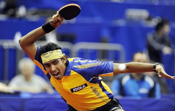 Sharath reaches second round at World TT