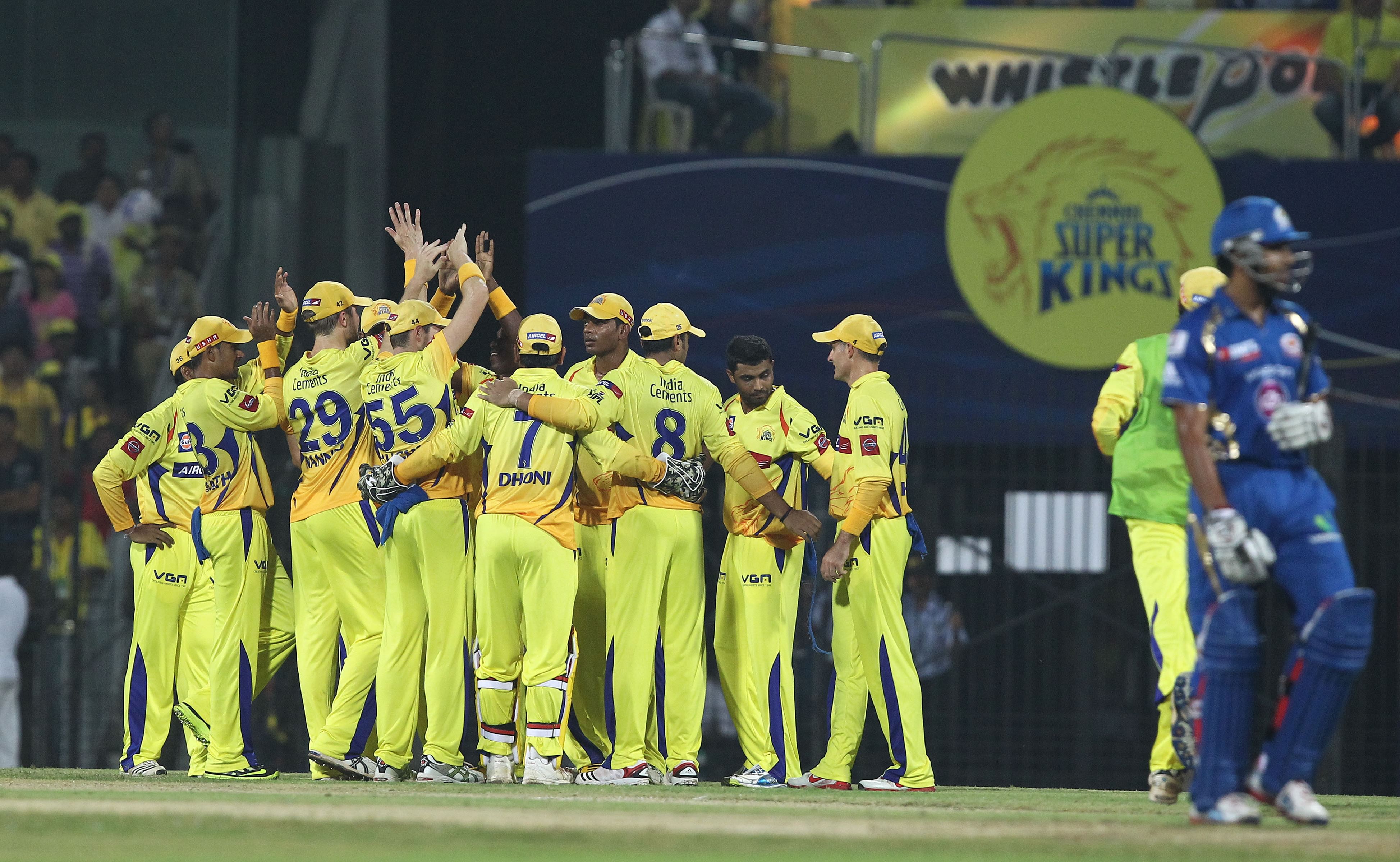 Chennai Super Kings players celebrate the fall of wicket of Mumbai Indians` Rohit Sharma at Chennai on April 6, 2013. (Photo: IANS)