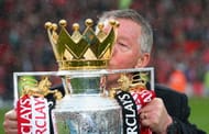 Ferguson plants a kiss on the Premier League trophy following the Barclays Premier League match against Swansea City at Old Trafford on May 12, 2013 in Manchester, England. (Getty Images)
