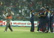 Delhi Daredevils players celebrate as Kumar Sangakkara walks back to the pavillion during the match between Delhi Daredevils and Sunrisers Hyderabad at Feroz Shah Kotla in New Delhi on April 12, 2013. (Photo: IANS)