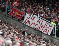 Immortal: Old Trafford was filled with banners such as this one and fans were given 'Champions 20 | 13' flags by the club on what was a emotional day at Old Trafford. (Getty Images)