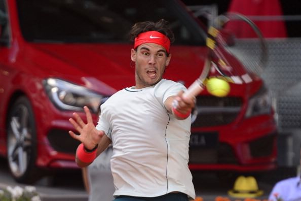 Nadal thwarts off stiff challenge from David Ferrer