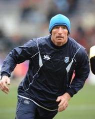 Wales rugby star Gareth Thomas warms up prior to Cardiff's European Cup match against Toulouse on December 19, 2009