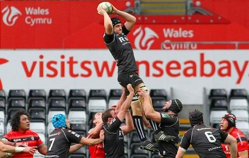 Ospreys play a European Cup match against Toulouse in front of rows of empty seats at Liberty Stadium in Swansea