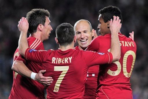 Bayern Munich players celebrate their Champions League victory over Barcelona at the Nou Camp stadium on May 1, 2013