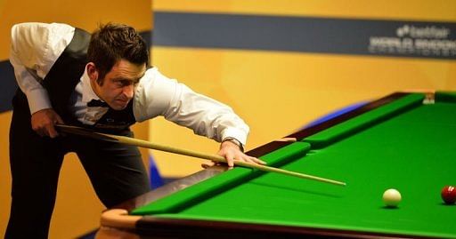 Ronnie O&#039;Sullivan of England plays a shot at The Crucible in Sheffield, northern England on April 30, 2013