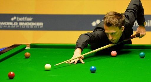 Judd Trump of England plays a shot at The Crucible in Sheffield, England, on April 30, 2013