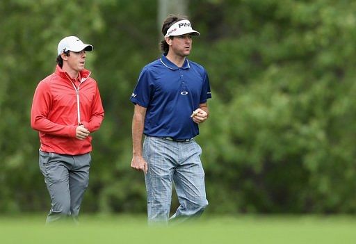 Rory McIlroy walks down the fairway with Bubba Watson at the Wells Fargo Championship on May 2, 2013