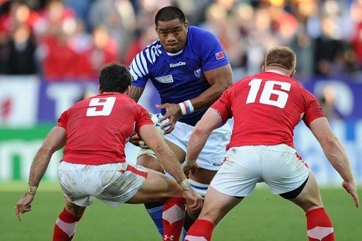 Samoa&#039;s Joe Tekori (C) is pictured during their World Cup match against Wales in Hamilton on September 18, 2011