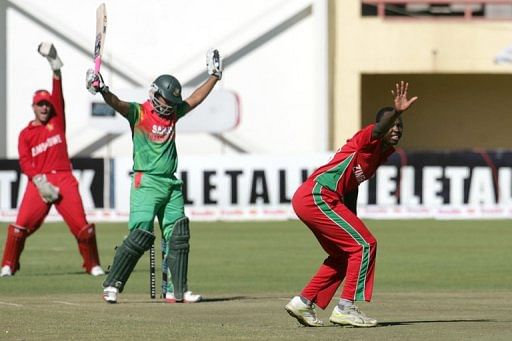 Tendai Chatara appeals for the wicket of Bangladesh batsman Tamim Iqbal in Bulawayo on May 3, 2013