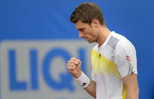 Germany&#039;s Daniel Brands reacts during his ATP tennis BMW Open quarter-final match in Munich, May 3, 2013