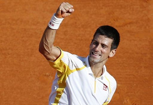 Serbia&#039;s Novak Djokovic celebrates winning the Monte-Carlo ATP Masters Series on April 21, 2013 in Monaco