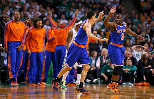 Knicks&#039; Pablo Prigioni and Raymond Felton celebrate during the game against the Celtics on May 3, 2013 in Boston