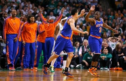 Knicks' Pablo Prigioni and Raymond Felton celebrate during the game against the Celtics on May 3, 2013 in Boston