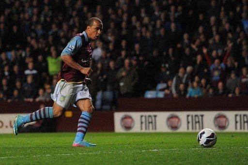 Aston Villa&#039;s striker Gabriel Agbonlahor scores at Villa Park in Birmingham, April 29, 2013
