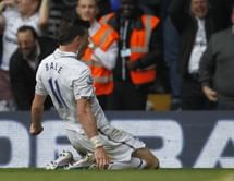Bale sends Spurs fourth, Wigan close on safety