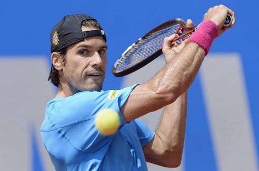 Tommy Haas returns a shot during the  BMW Open final against Philipp Kohlschreiber in Munich, on May 5, 2013