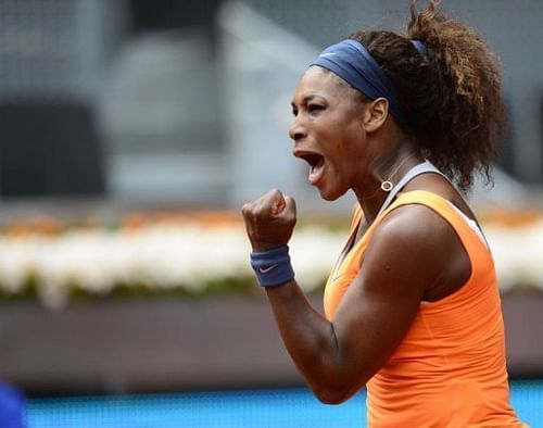 US player Serena Williams celebrates after beating Spain's Lourdes Dominguez Lino at the Madrid Masters on May 7, 2013