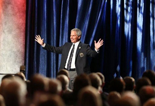 Golfer Fred Couples stands on stage during his induction into the World Golf Hall of Fame on May 6, 2013 in Florida