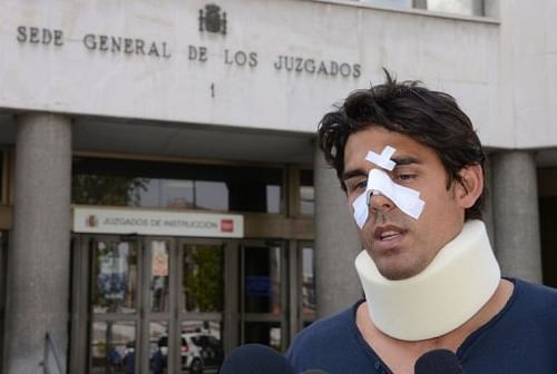 Thomas Drouet of Monaco, training partner of Australian tennis player Bernard Tomic, leaves court in Madrid, May 6, 2013