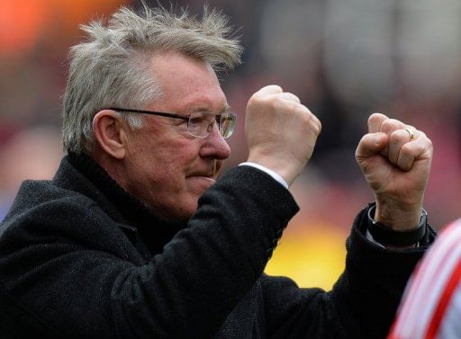 Manchester United  manager Alex Ferguson celebrates after a match against Stoke City on April 14, 2013