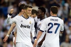 Madrid hit Malaga for six, delay Barca title party