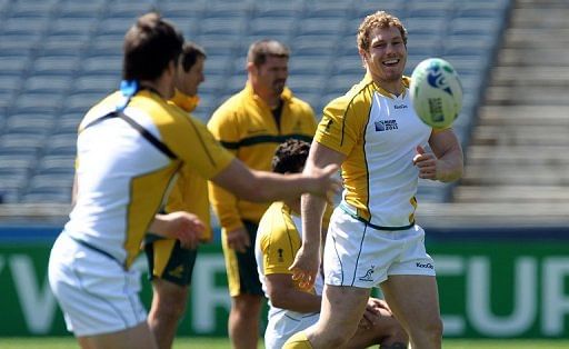 Australian rugby players take part in a training session at Eden Park in Auckland on October 20, 2011