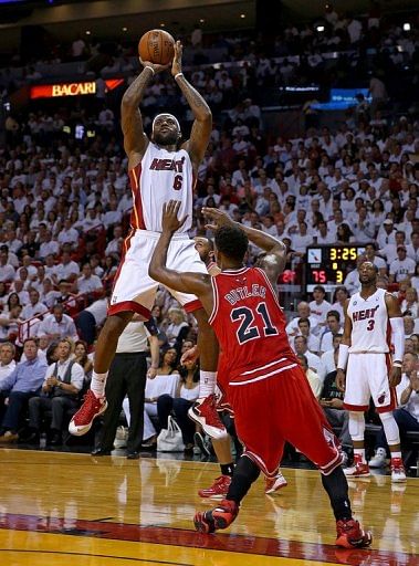 LeBron James shoots over Jimmy Butler during Game Two of the Eastern Conference Semifinals on May 8, 2013 in Miami