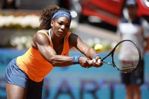 US player Serena Williams returns the ball to Russian player Maria Kirilenko in Madrid on May 9, 2013