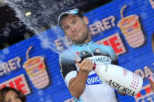 Mark Cavendish celebrates on the podium on May 9, 2013 in Margherita di Savoia