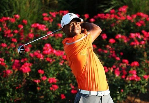 Tiger Woods plays a shot from the 18th tee during round one of the Players Championship in Florida  on May 9, 2013