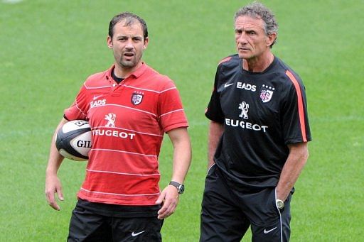 Toulouse head coach Guy Noves (R) and  backs coach Jean-Baptiste Elissalde attend a training session on May 9, 2013
