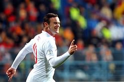 Rooney slams Twitter account claims