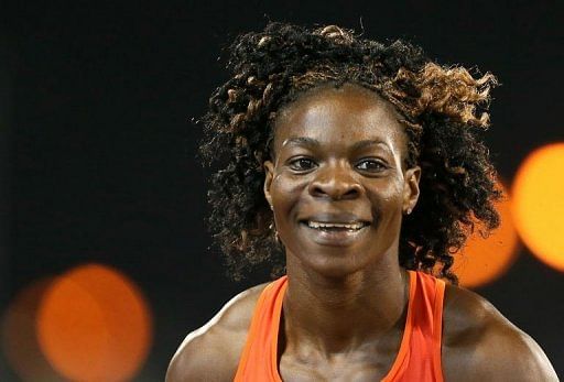 Botswana&#039;s Amantle Montsho laughs after winning the women&#039;s 400m final in Doha on May 10, 2013