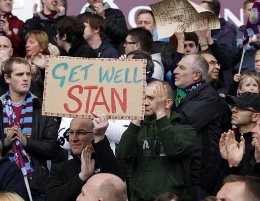 Supporters support Aston Villa&#039;s captain, Bulgarian Stiliyan Petrov at Villa Park, Birmingham, March 31, 2012