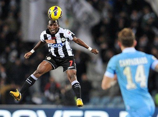 Udinese&#039;s Emmanuel Agyemang Badu heads the ball during a Serie A  match against Napoli on February 25, 2013