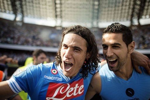Napoli&#039;s Edinson Cavani (L) celebrates with Miguel Angel Britos on May 12, 2013 at San Paolo Stadium