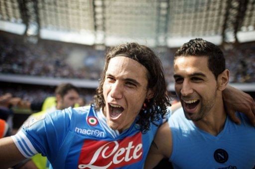 Napoli&#039;s Edinson Cavani (L) celebrates with Miguel Angel Britos on May 12, 2013 at San Paolo Stadium