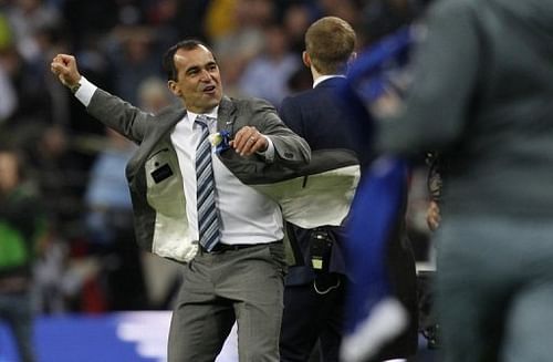 Wigan Athletic manager Roberto Martinez celebrates after winning the FA Cup final against Man City on May 11, 2013 Wigan Athletic manager Roberto Martinez celebrates after winning the FA Cup final against Man City on May 11, 2013