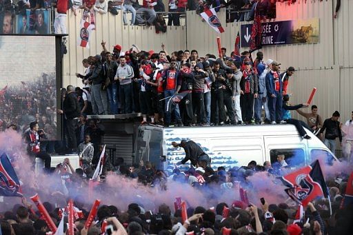 Paris Saint-Germain&#039;s supporters are gathered to celebrate the club&#039;s championship title, on May 13, 2013 in Paris