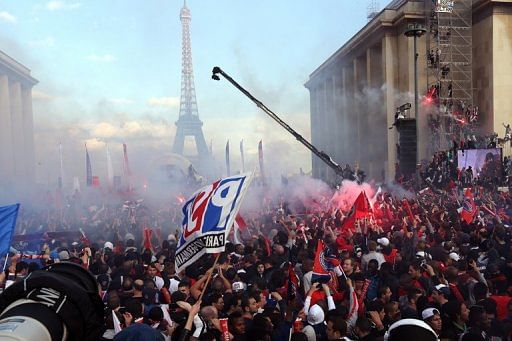 Paris Saint-Germain&#039;s supporters are gathered to celebrate the club&#039;s championship title, on May 13, 2013