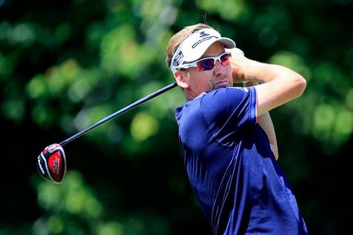 Ian Poulter of England plays a shot on May 10, 2013 in Ponte Vedra Beach, Florida