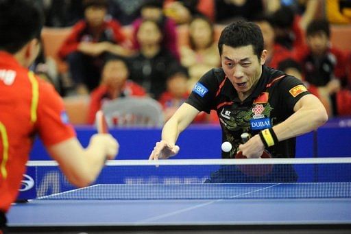 China&#039;s Xu Xin competes during the ITTF Korea Open men&#039;s singles final in Incheon, South Korea on April 7, 2013