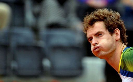 Andy Murray reacts during his match against Marcel Granollers on May 15, 2013, in Rome