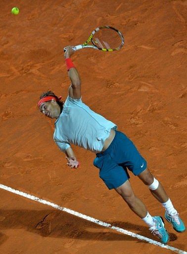 Rafael Nadal serves to Fabio Fognini in Rome, on May 15, 2013