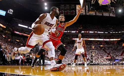 Dwyane Wade of the Miami Heat and Chicago Bulls' Marco Belinelli are pictured during their game in Miami on May 15, 2013