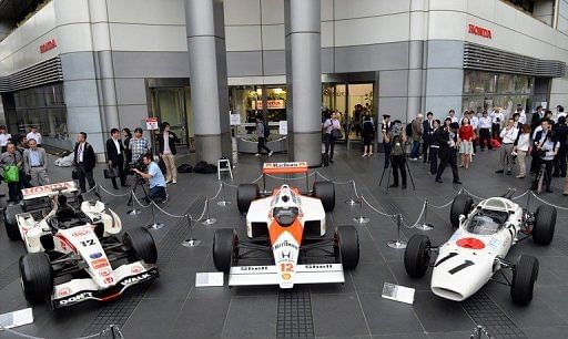 Three generations of Honda Formula One cars on display in Tokyo, on May 16, 2013